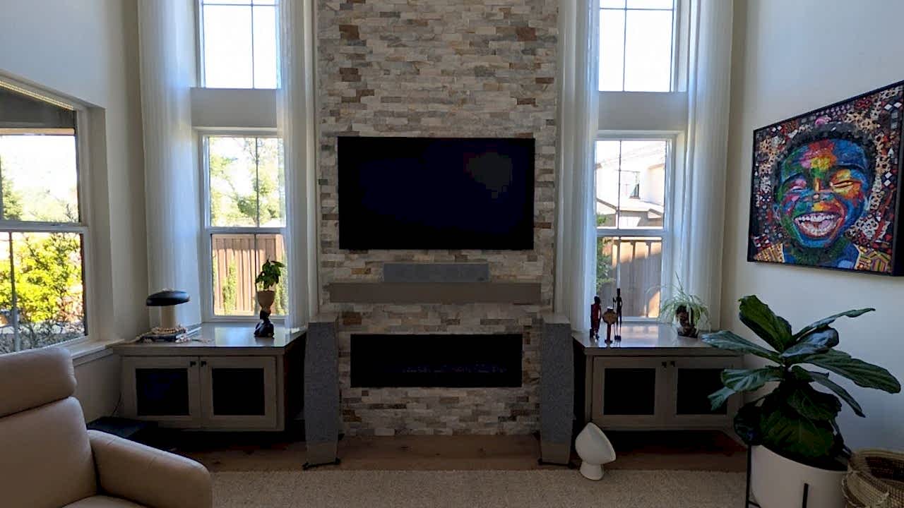 Samsung Frame TV mounted on stacked stone fireplace in Granite Bay, CA